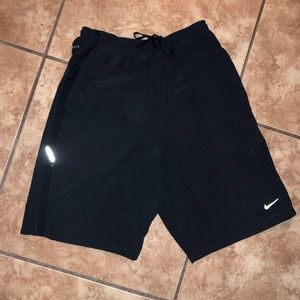 Nike small men’s dark blue dri-fit running shorts.